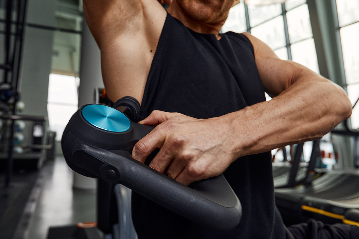 cómo usar una pistola de masaje