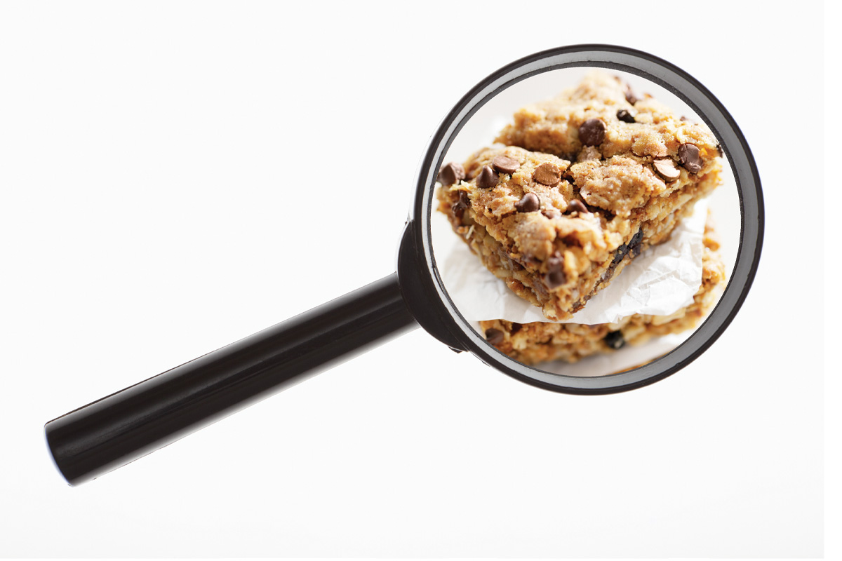 lupa agrandando alimentos ultraprocesados